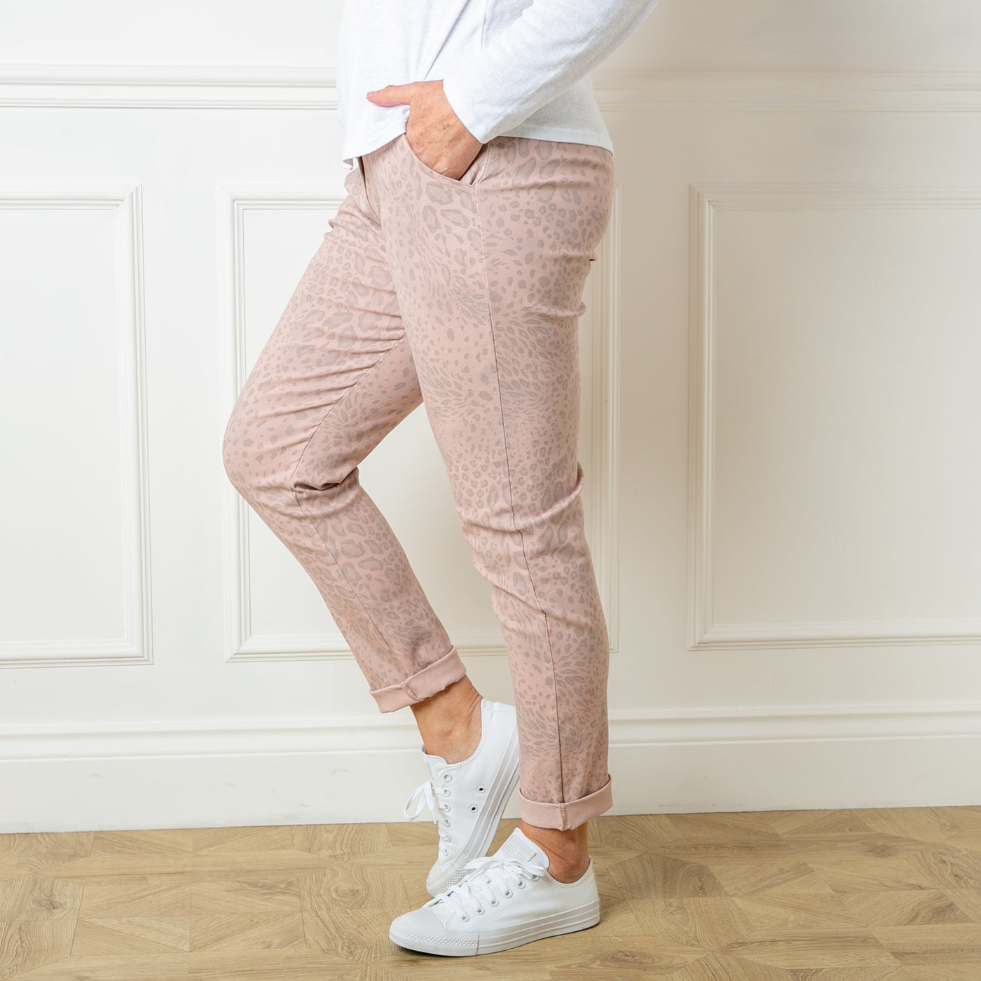 The blush pink Animal Print Stretch Trousers in a fun leopard cheetah print pattern